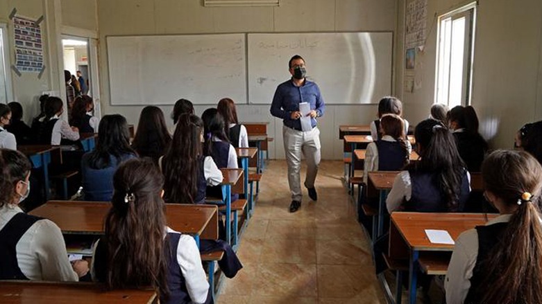 Yezidi female students sitting in a classroom at one of the IDP camps in the Kurdistan Region's Duhok province. (Photo: Ismael Adnan/AFP)